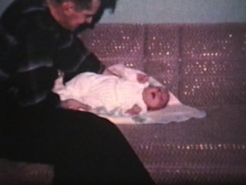 Dad Picking Up His Baby Boy (1962 - Vintage 8mm film)