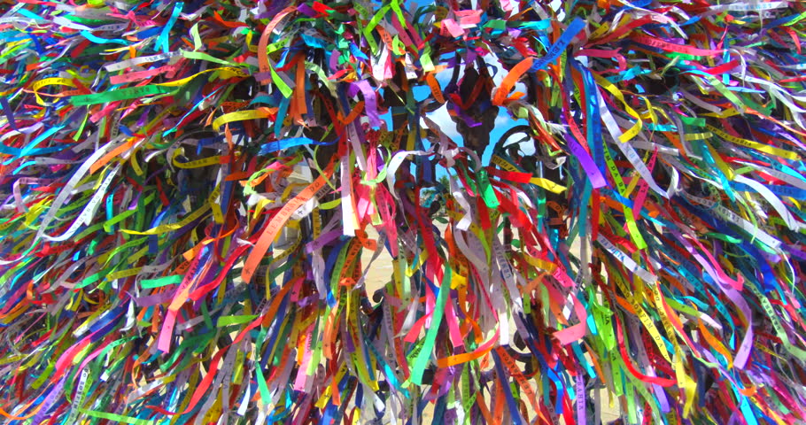 Wind blowing wall of Brazilian wish ribbons at the famous Igreja Nosso Senhor do Bonfim da Bahia church in Salvador Bahia Brazil Royalty-Free Stock Footage #6030722