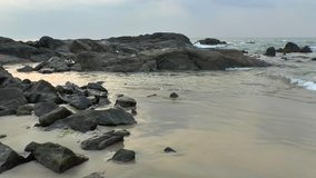 waves of the surf breaking on the rocks,Sri Lanka.