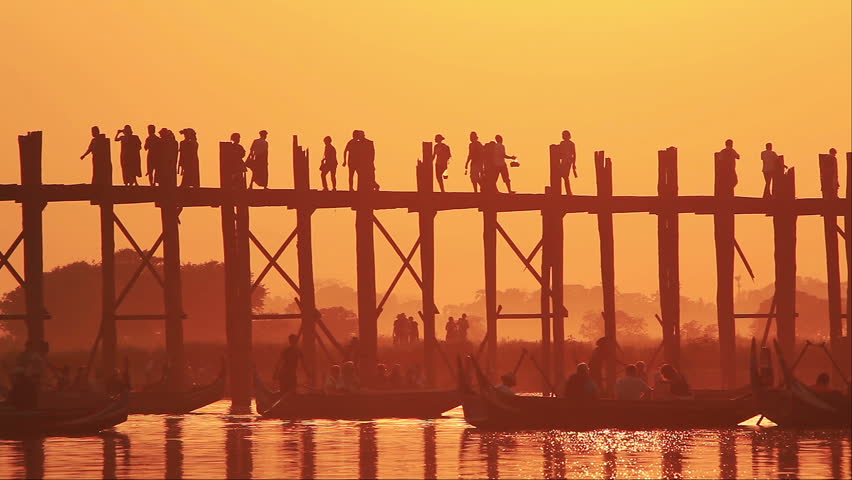 U Bein Bridge at sunset. Amarapura, Myanmar. Royalty-Free Stock Footage #6041453