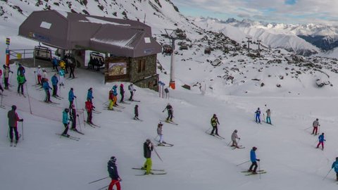 ISCHGL, AUSTRIA - 29 JANUARY 2014 - Ischgl mountain top ski lift station skiers and snowboarders disembark