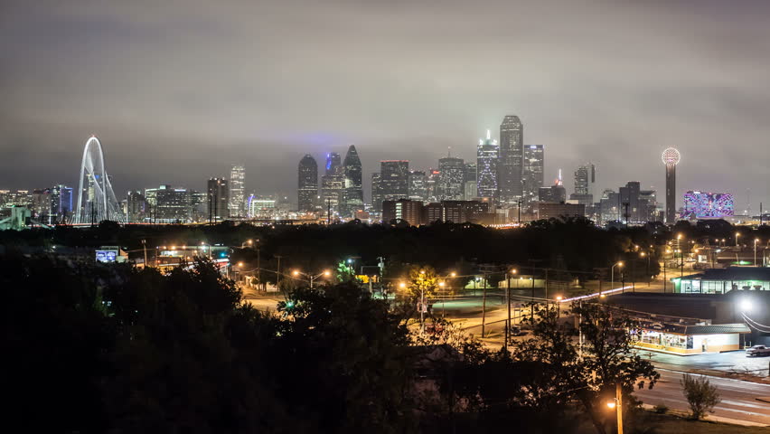 DALLAS - CIRCA NOVEMBER 2013: Dallas, Texas, USA, city skyline, night to day
