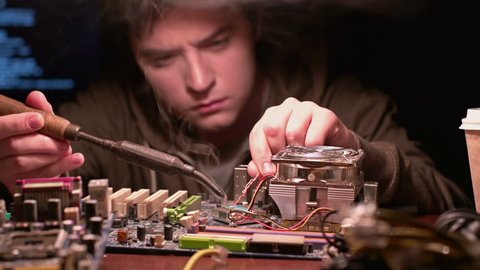 Shifting focus from processor to computer expert with soldering iron