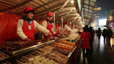 CHINA - CIRCA JANUARY 2014: Market stall, Donghuamen Night Market, Wangfujing, Dongcheng District, Beijing, China