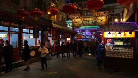 CHINA - CIRCA JANUARY 2014: China, Beijing, Food stalls in Wanfujing Dajie Street, Beijing's main shopping street at night