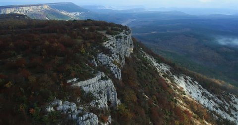 Aerial View: Mountain plateau of Burunchak, near Bakhchisaray. Crimea. Autumn 2013. The outer ridge of Crimean mountains is a series cuesta gradually rise to about 350 m.