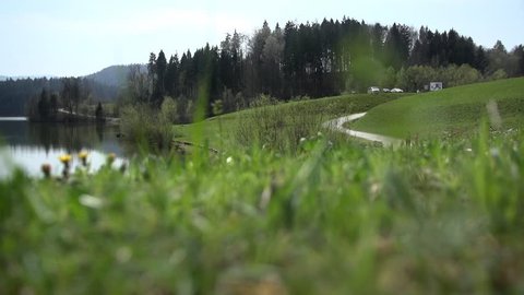 Slow Motion Landscape With Lake And Women Running
