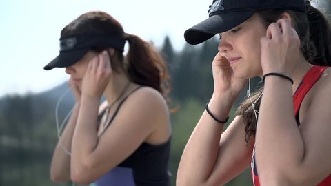 Two Women Getting Ready For Running