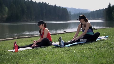 Slow motion Leg Exercise At Beautiful Lake