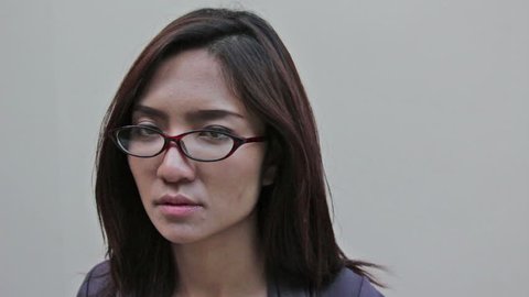 angry woman, looking through glasses