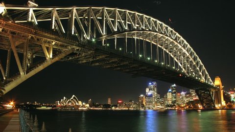 Time lapse of Sydney Harbour #5. A night from the far side of the harbour  featuring Sydney Harbour Bridge in the foreground and the Sydney Opera House in background.