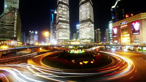 4k video,the light trails of city traffic on the modern building background in shanghai china,time lapse. gh2_07593_4k 库存视频