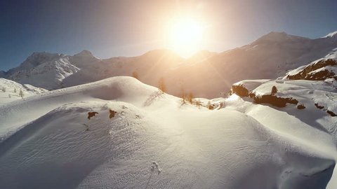 snow winter landscape. mountain panorama view. aerial fly over. sunset nature