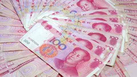 Banknotes China one hundred yuan laid out on the table.  Full HD slow motion 1080p 