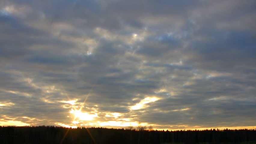 Sunset over forest, HD time lapse