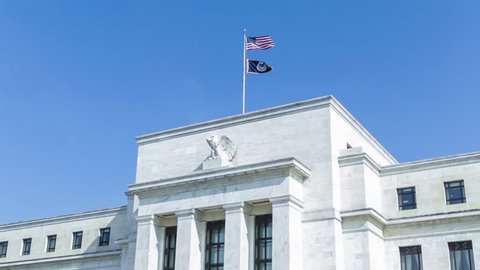 Washington, DC - Flags waving over the Federal Reserve building
