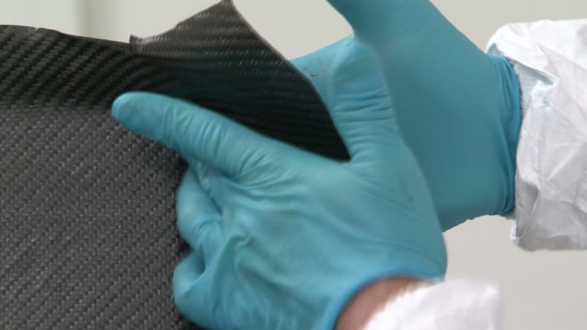 Man assembling carbon fibre piece
 | Shutterstock HD Video #6082643