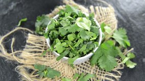Portion of fresh rotating Coriander (not loopable video)