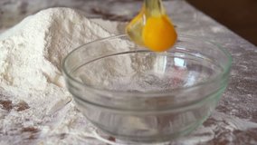 hand cracking egg into a bowl, super slow motion, shot at 240fps
 - Powered by Shutterstock - Get 15% off with code: PIKWIZARD15