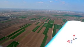 View from the airplane ; View of the Earth from the cabin of the aircraft,video clip