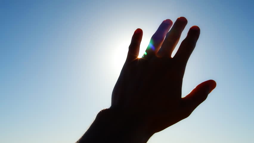 Hand to sun
