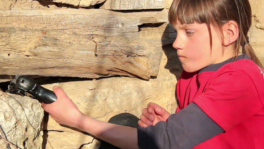 Boy with gun.Boy playing weapon.Little warrior.Teenager a gun aiming.Close up -footage 1920x1080p. 