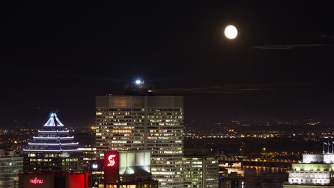 Time-lapse of a full moon rising above the City of Montreal. July 2013.