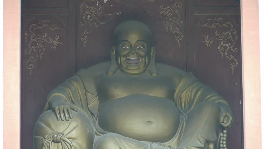 Saw statue of Bodhisattva Maitreya,Enter yard from door of Chinese ancient buildings. gh2_02447