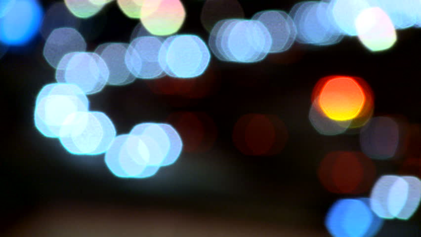 Soft focus lights of night time traffic