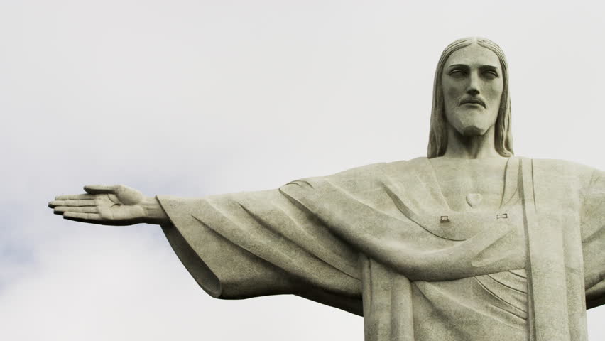 RIO DE JANEIRO, BRAZIL - CIRCA JUNE 2013: Pan of the statue of Christ at the top