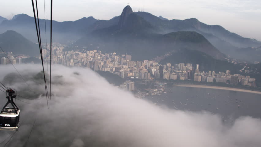 Gondola ride down the mountain on a misty day in Rio de Janeiro, Brazil