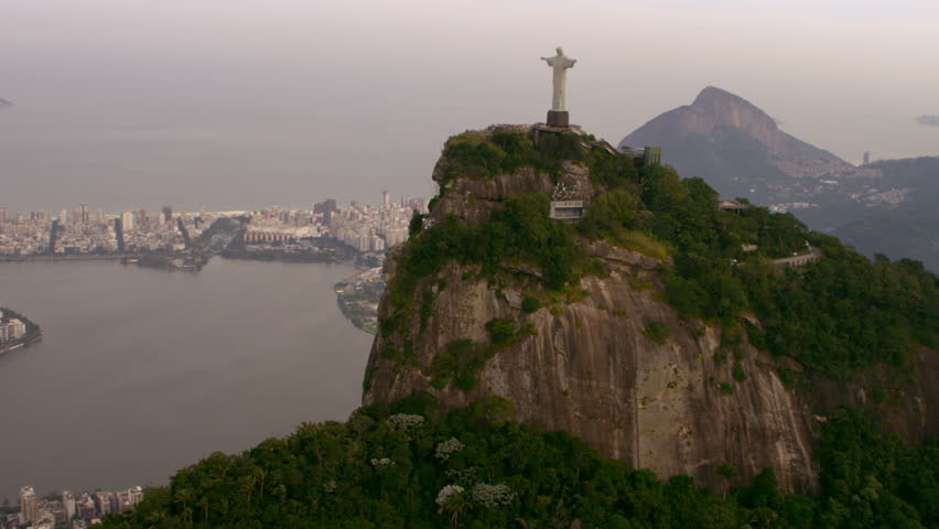 Aerial video of Art Deco Statue, Lagoa, and Rio de Janeiro.