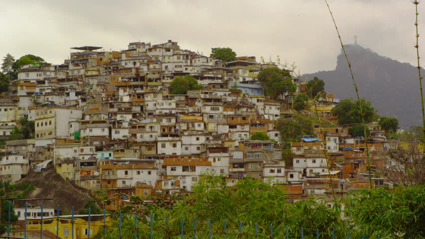 Slow tracking shot of a favela on a hill in Rio de Janeiro Brazil