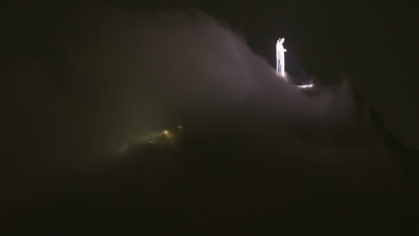 Static night shot of wind and Christ statue on Corcovado