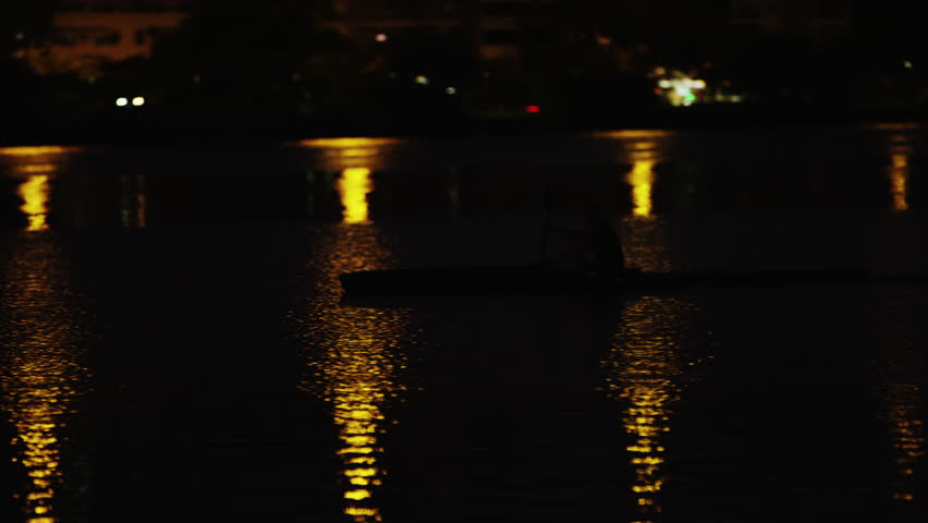 Night kayaking near Rio shore