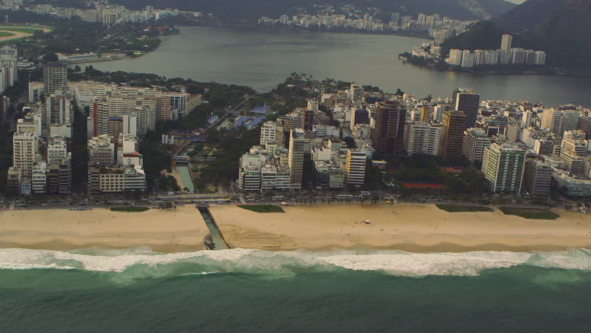 Aerial tracking shot of Rio de Janeiro coastline in Brazil