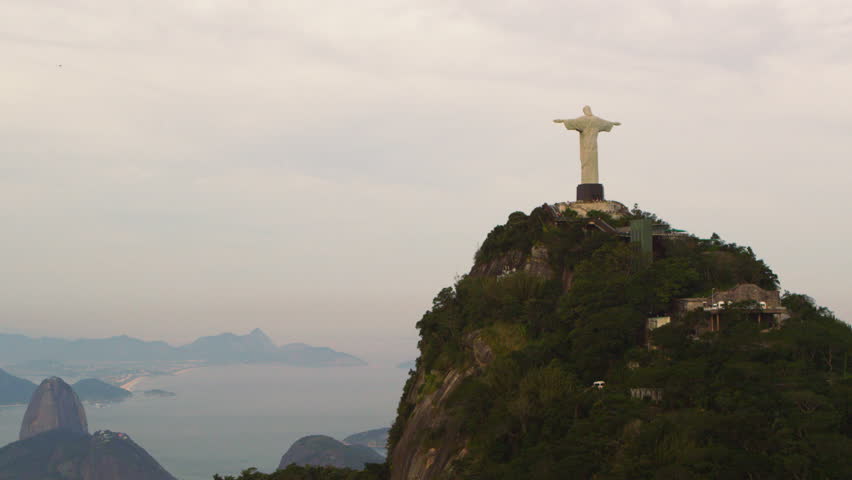 Aerial tracking shot of Cristo Redentor statue in Rio de Janeiro, Brazil