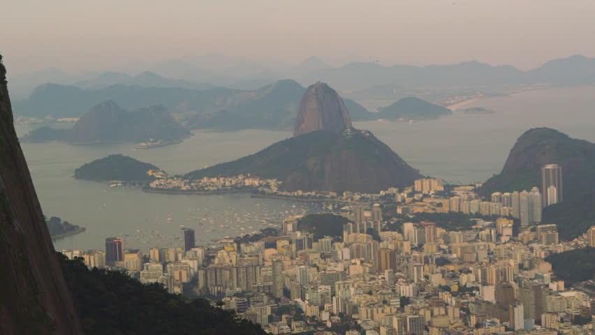 Tracking aerial shot of Rio de Janeiro, Brazil taken from a helicopter
