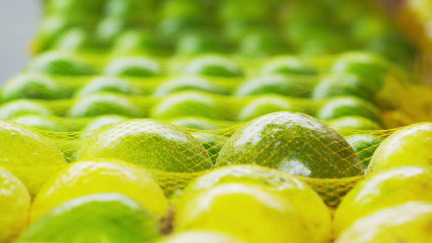 Close-up shot of green passion fruits in a market in Rio de Janeiro, Brazil