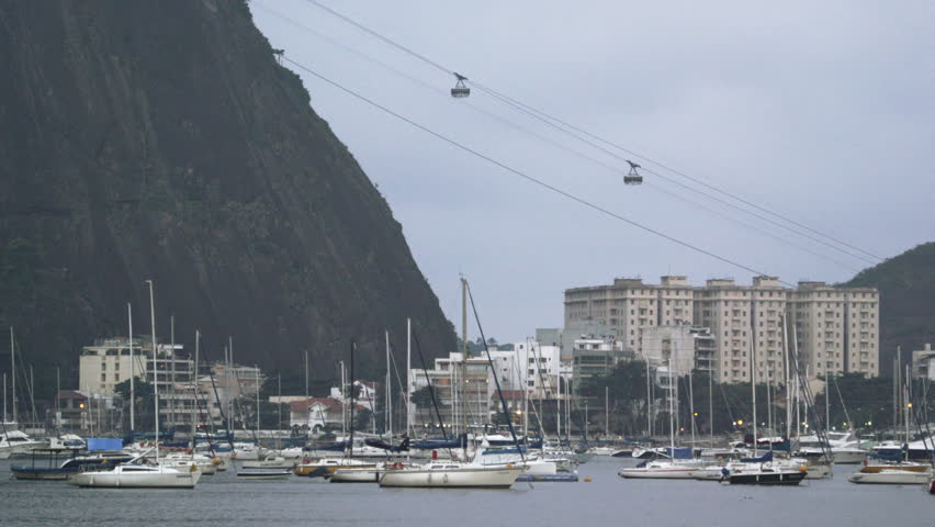 An aerial helicopter view of an airliner flying past Corcovado Mountain in Rio