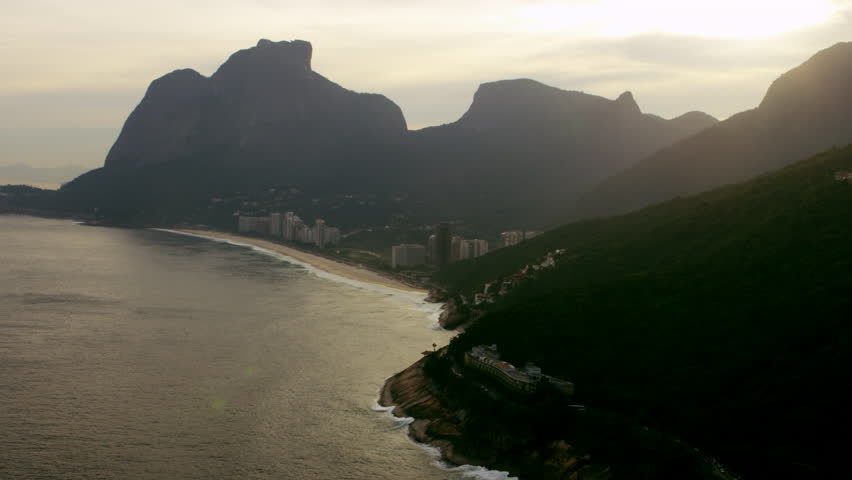 Aerial shot of cliffs on the edge of the shoreline in Rio.