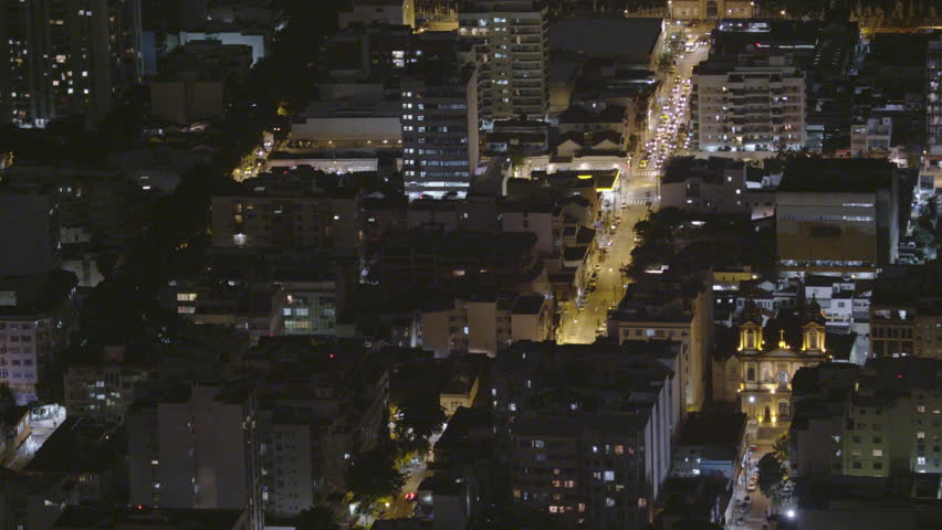 Time-lapse shot of downtown Rio De Janeiro at night, traffic driving down a main