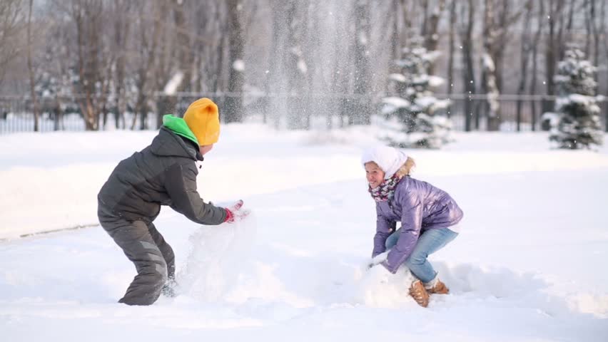 Boy and Girl Throw Snow Stock Footage Video (100% Royalty-free) 6109868 ...