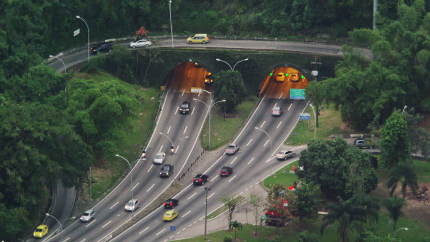 Morning still shot of the fast traffic at a tunneled intersection in Rio de