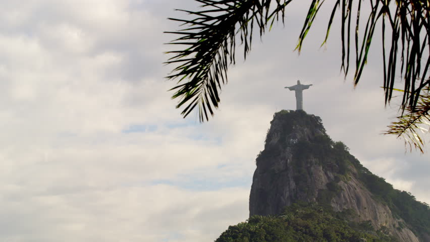 RIO DE JANEIRO, BRAZIL - JUNE: Pan of Christ statue against cloudy sky