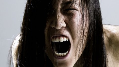 Horror movie scary chinese woman screaming wild
