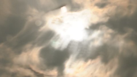 footage of shaking of water in a pond with reflection of cloud and sun