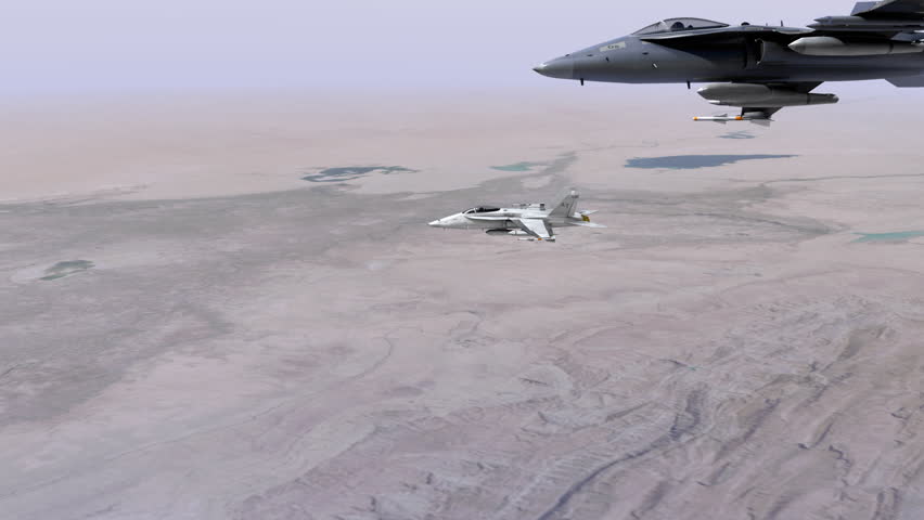 Two F18 fighter jets flying side by side over the Middle East.