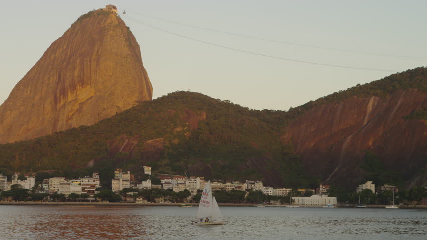 RIO DE JANEIRO, BRAZIL - JUNE: Static shot of a sailboat on Guanabara Bay with