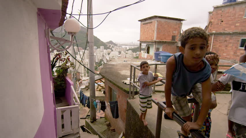 RIO DE JANEIRO, BRAZIL - JUNE 23: Slow dolly shot, favela occupants on Jun 23,
